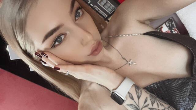 Blue-eyed blonde camgirl Erica_With_Love invites you to have a sex chat with her privately and cum
